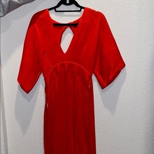 Reddish orange dress with cut outs